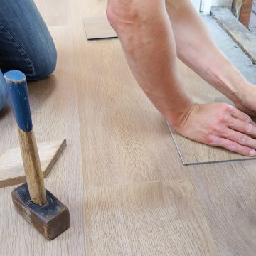 measuring out tiles for a home reno